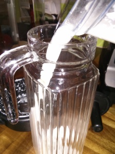 Pour the almond milk into a glass container.